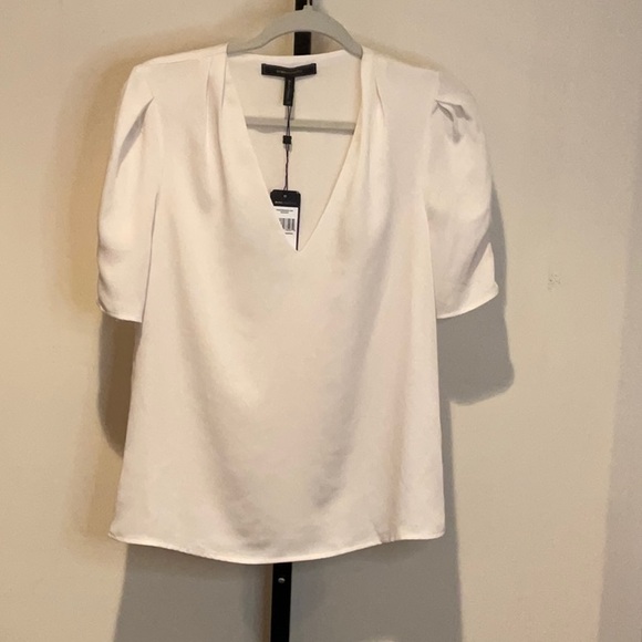 BCBGMaxAzria Tops - BCBG white gardenia silk pleated sleeve blouse XS